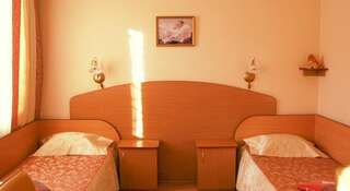 Гостиница Вега Иркутск Односпальная кровать в общем номере с 3 кроватями-6